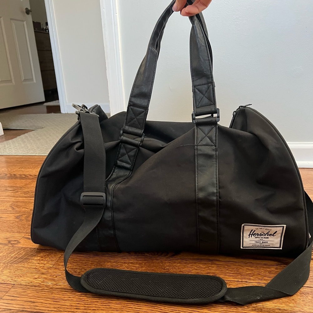Herschel black duffel bag